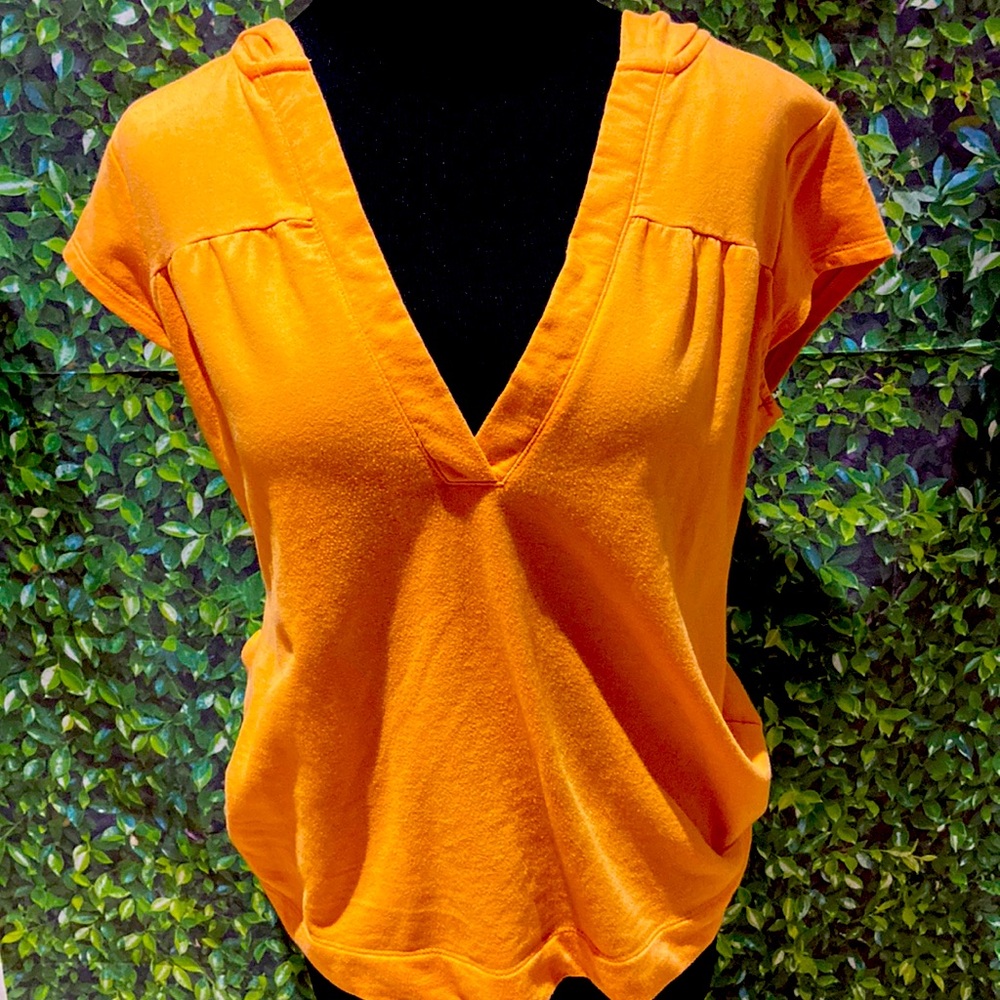 An orange shirt ripe for summer